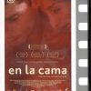 En la cama.